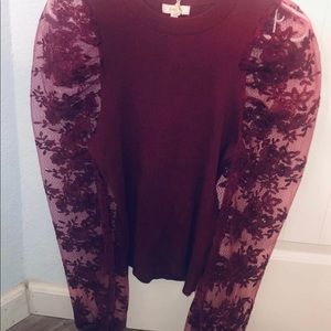 beautiful blouse with fabric sleeves.